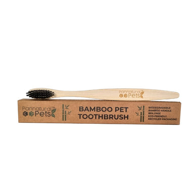 Eco-friendly bamboo toothbrush for pets by Pannatural Pets, made with a biodegradable handle and soft bristles for gentle cleaning.