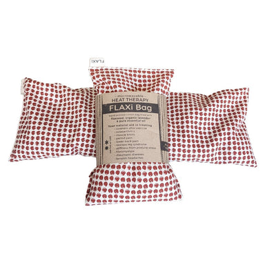 Red polka dot flaxseed natural heat therapy with a label on a white background