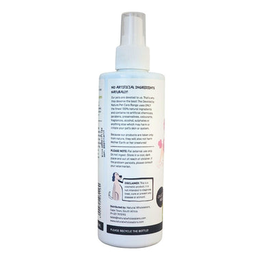 Devoted by Nature Anti-Itch Spray bottle showing the back label with “No Artificial Ingredients Naturally!” messaging and product care information.