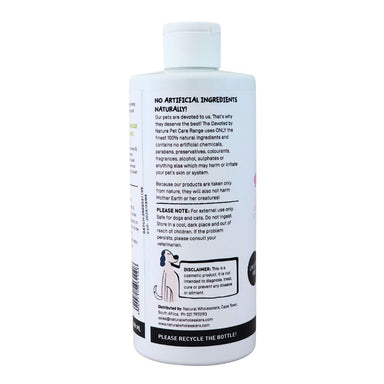 Devoted by Nature Anti-Itch Shampoo bottle showing the back label with “No Artificial Ingredients Naturally!” messaging and product care information.
