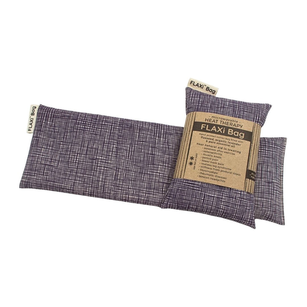 FLAXi Bag microwavable heat therapy bag filled with flaxseed and organic lavender, with a product label showing heat therapy uses.